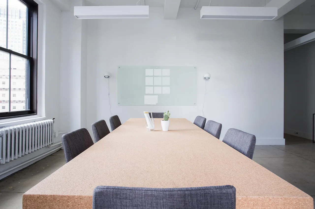 Modern conference room with layered LED lighting